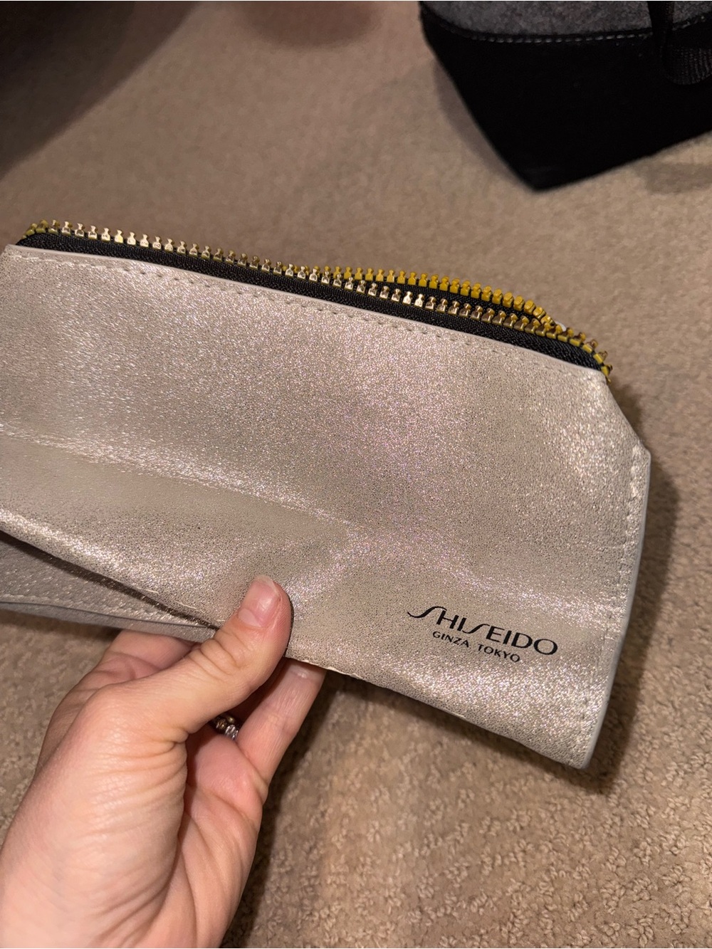 Shiseido Metallic Silver Cosmetic Bag with Yellow Accent Zipper